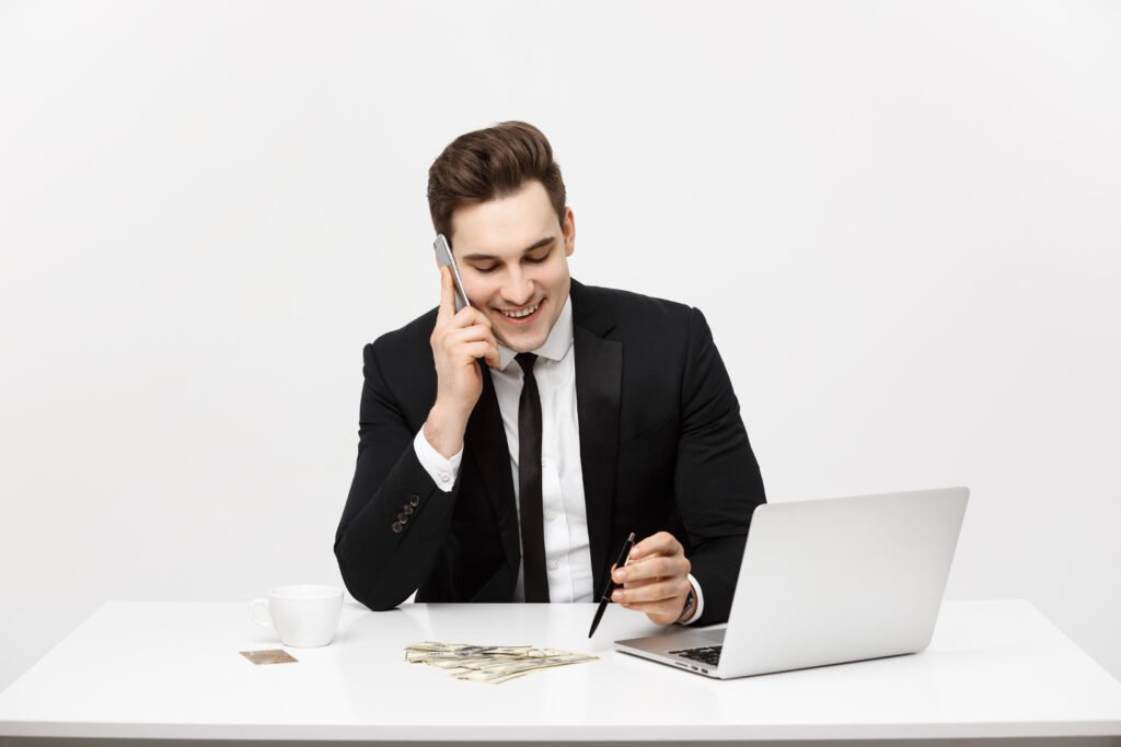“Business professionals celebrating a successful business transaction and deal closing”